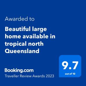 道格拉斯港Beautiful large home available in tropical north Queensland的一部手机屏幕的屏幕,上面写着给美丽的大房子的文本,