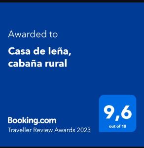 莱瓦镇Casa de leña, cabaña rural的手机的屏幕,手机的文本被授予casa de latina