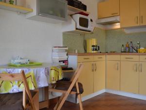 Appartement Saint-Cyprien, 1 pièce, 4 personnes - FR-1-225D-434的厨房或小厨房