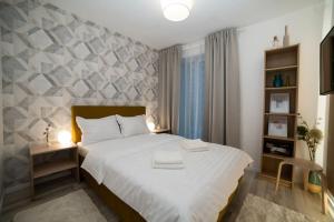 蒂米什瓦拉Carpe Diem Travel的卧室配有一张白色大床
