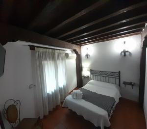 Hotel Rural Sierra de Francia客房内的一张或多张床位