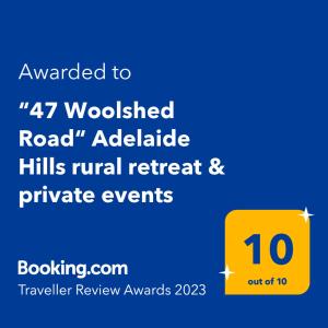 Mount Torrens47 WOOLSHED ROAD - Adelaide Hills rural retreat的黄色标志的屏幕,数字为40