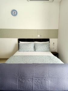 BS City Homestay2 - Miri Times Square客房内的一张或多张床位