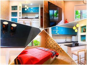 特里凡得琅Gangothri的厨房配有蓝色橱柜和红色的床。