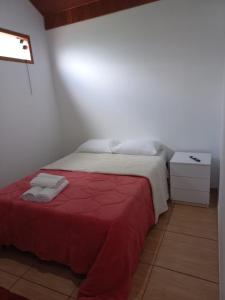 Suites Estrela客房内的一张或多张床位