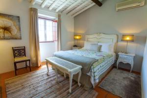 阿瓜阿尔特庄园酒店客房内的一张或多张床位