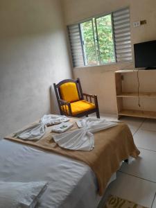 Pousada dos Tucanos客房内的一张或多张床位