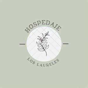 WandaHospedaje Los Laureles的花店的标志