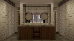 纳闽巴霍绿山精品酒店 的浴室设有2个水槽和2面镜子