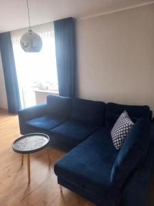 Apartament w centrum Raciborza的休息区