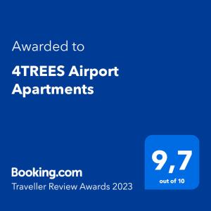 大戈里察4TREES Airport Apartments的林木机场公寓标有蓝色标语