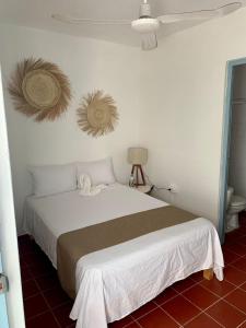 Creta Hotel & Suites客房内的一张或多张床位