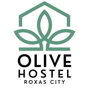 罗哈斯城Olive Hostel Roxas City的橄榄树修复后的玫瑰城标志