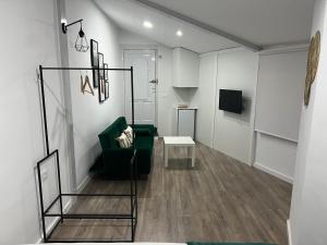 Apartamento en Cieza AM的电视和/或娱乐中心