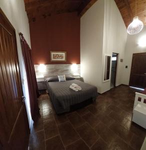 CEDRO AZUL - Hostería y Cabañas de montaña客房内的一张或多张床位