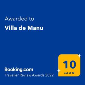 罗德镇Villa de Manu的黄色盒子,文字被授予曼努姆城