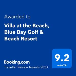 Blue BayVilla at the Beach, Blue Bay Golf & Beach Resort的蓝灰色高尔夫和海滩度假村的屏幕,上面的文字被授予V