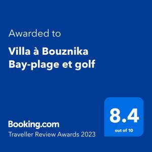 布兹尼盖Villa à Bouznika Bay-plage et golf的手机的屏幕,手机的文字被授予别墅大道