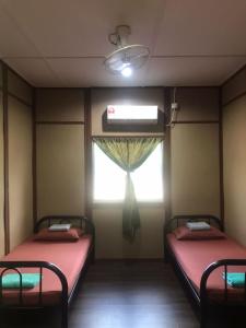 Liana Hostel Taman Negara客房内的一张或多张双层床