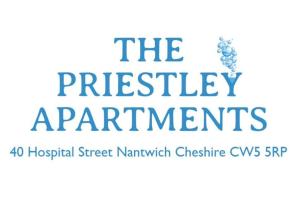 南特威奇Priestley Apartments Apt 1的带有蓝色标志的前缀的标志