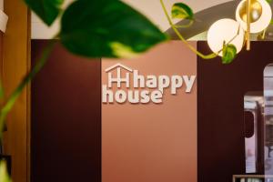 法鲁幸福旅馆的花草欢度幸福的房屋标志