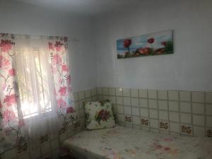 Tranquila Casa de Campo cerca de Chiclana客房内的一张或多张床位