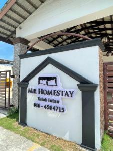 安顺MR Homestay HotelStyle Room Teluk Intan的特比利西伊迪奥利斯民宿的标志