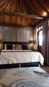 爪哇天堂山林小屋客房内的一张或多张床位