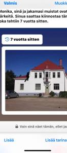罗威萨Vanha Kanttorila的一张白色房子的网站照片