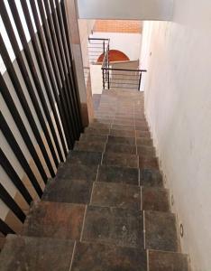 TlatlauquitepecSuite Aries的通往一栋建筑的楼梯