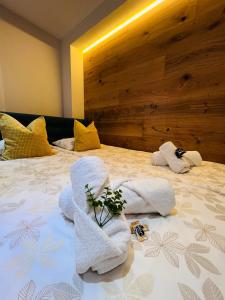 Apartamentos Prestige Málaga Suites客房内的一张或多张床位