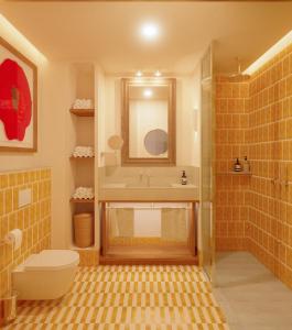 瓦伦西亚Hotel Casa Bassa的带淋浴、卫生间和盥洗盆的浴室