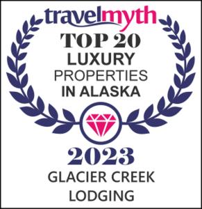 西沃德Glacier Creek Lodging的铝 ⁇ 亚顶级豪华公寓标志