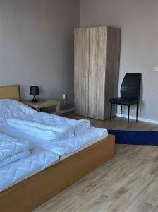 Apartment Dierhagen - Ostseebad 4客房内的一张或多张床位