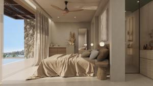 阿莫迪卡吕普索别墅酒店的一间卧室配有一张床和吊扇