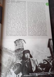 乌树故里乌斯古里里霍旅馆的一本书的一页,上面有一张男人的照片