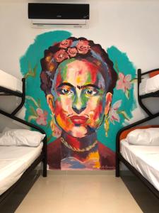 坎昆Villa Leo的头上玫瑰花的女人的壁画