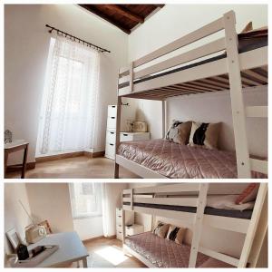 布拉恰诺La casa nel vicolo的卧室配有双层床的两张照片