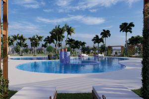 达累斯萨拉姆Delta Hotels by Marriott Dar es Salaam的一座棕榈树环绕的大型游泳池