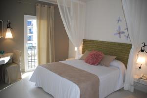 塔隆戈塔酒店 - 仅限成人客房内的一张或多张床位