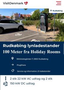 鲁德克丙Holiday rooms Rudkøbing的停车场停车场内停车场的网站的屏幕