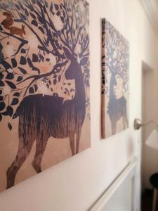 比萨Casa Clementina的墙上的鹿画