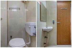 贾姆谢德布尔OYO Hotel Satguru的一间带卫生间和水槽的浴室