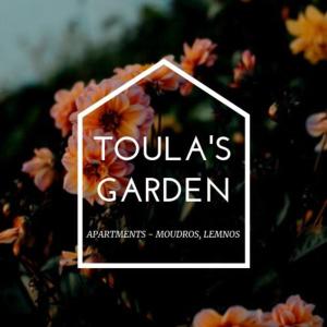 穆兹罗斯Toula's Garden - View Apartment的读着橘子花的果园的标志