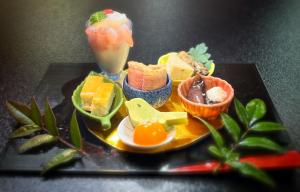 Itako割烹旅館霞ヶ浦的果盘和饮料