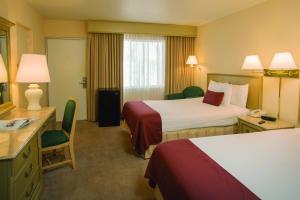 丽都湾泳滩沙堡度假酒店客房内的一张或多张床位