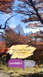 厄尔查尔坦Yellow House Cottage的树上黄色房子的标志