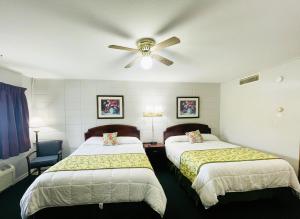 The Madison Inn Motel客房内的一张或多张床位