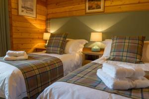 Stable Lodge客房内的一张或多张床位