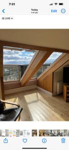 米尔盖West Highland Way Rooms ED30002F的客厅的一张照片,客厅设有大窗户